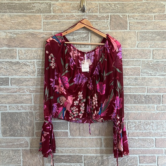 26. Free People Of Paradise Floral Bell Sleeve Blouse - Picture 3 of 6